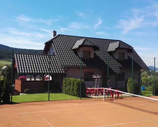 Apartmány u tenisového kurtu